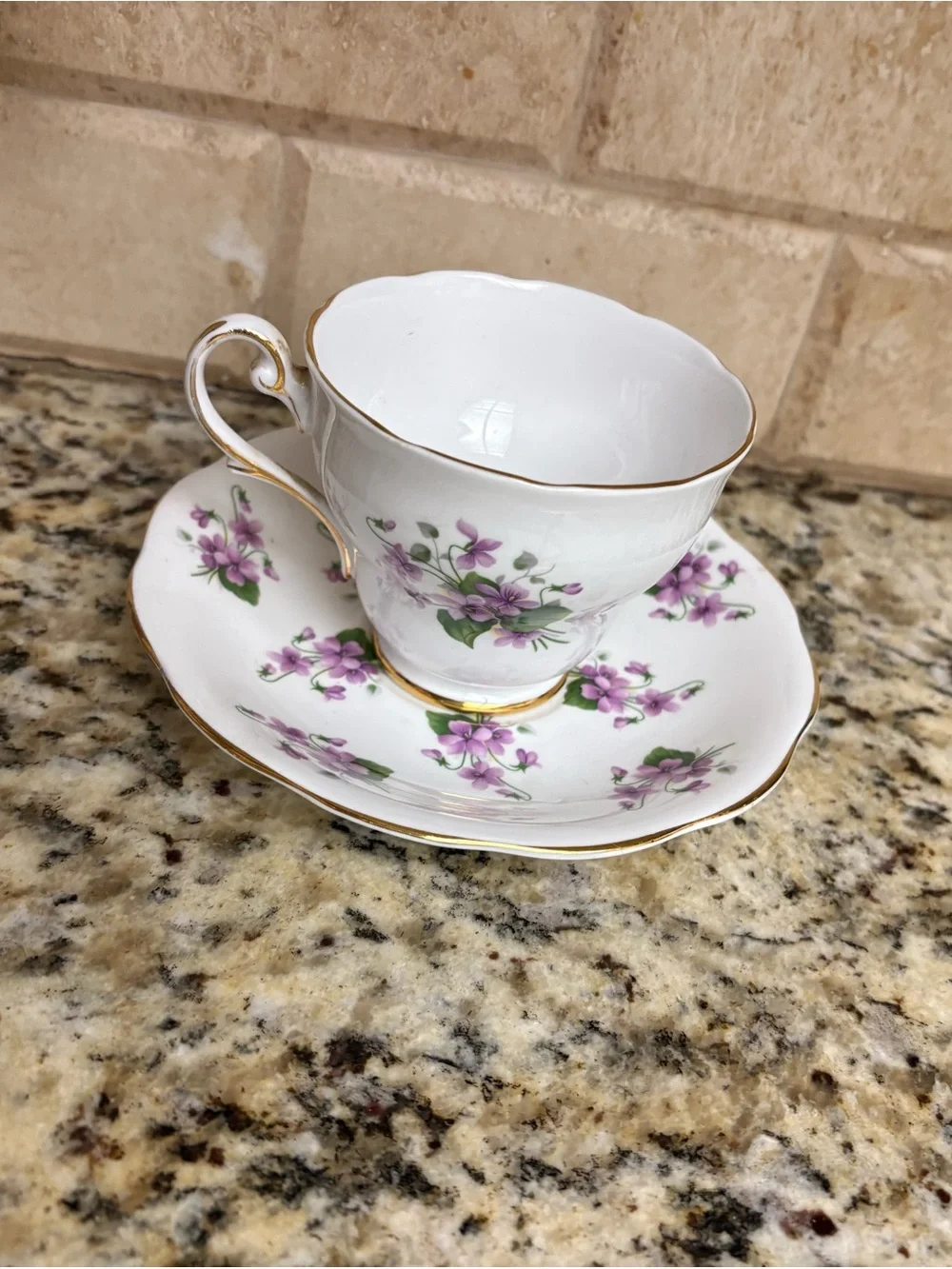 White Teacup & Saucer with Purple Floral Pattern and Gold Trim